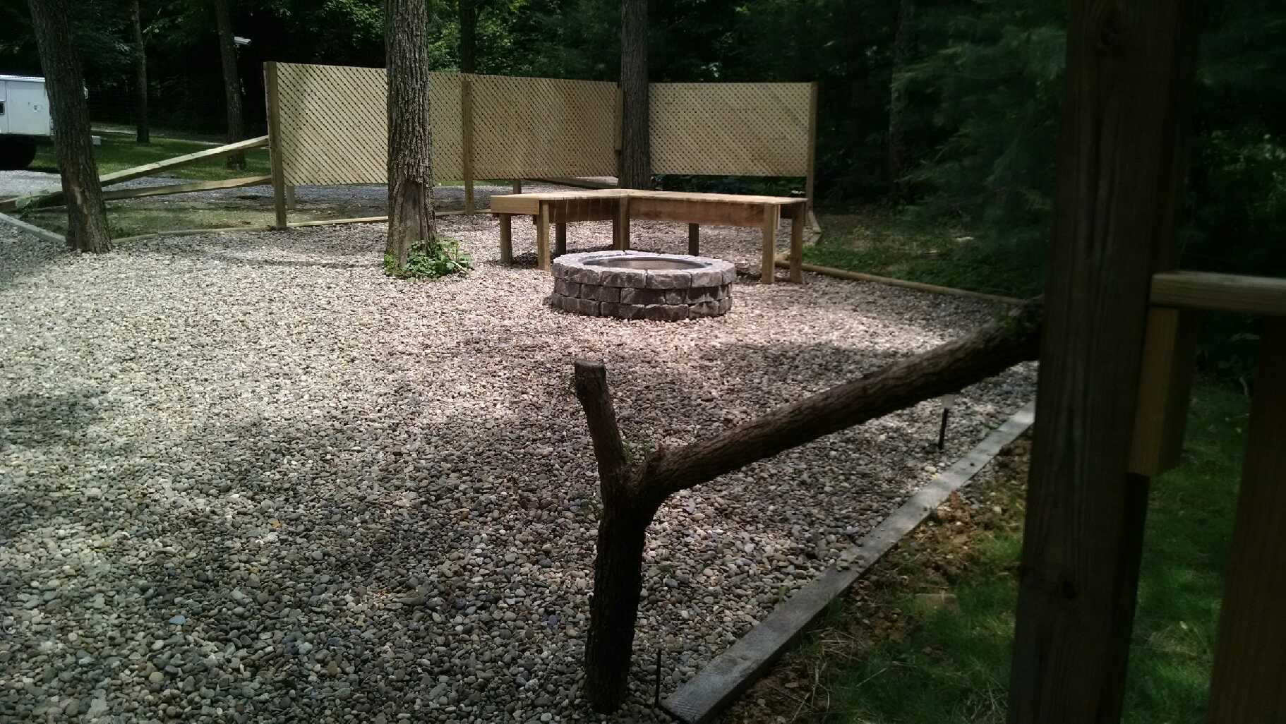 firepit, tall trees, seating